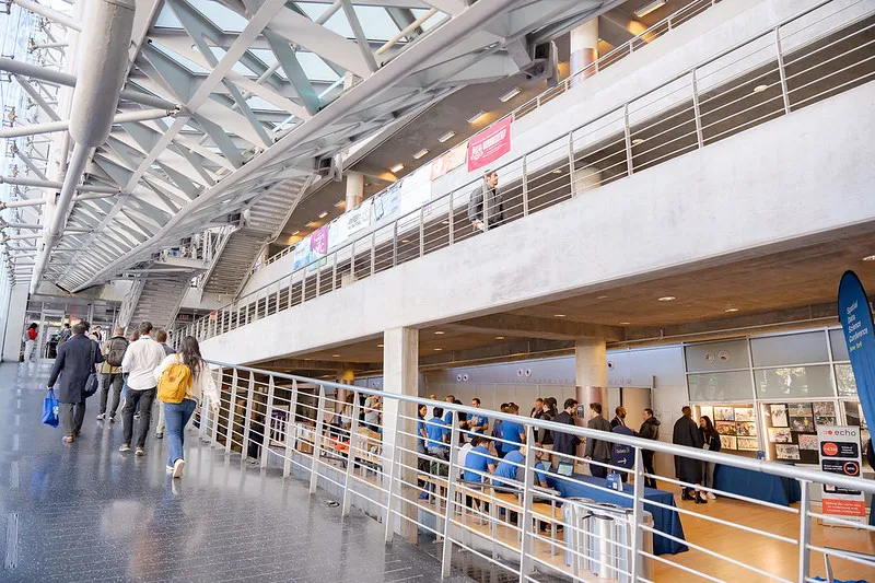 View of the sponsors booths and people doing networking